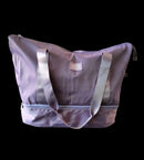 Bolsa de Viaje Multifuncional – Expandible, Impermeable y Elegante